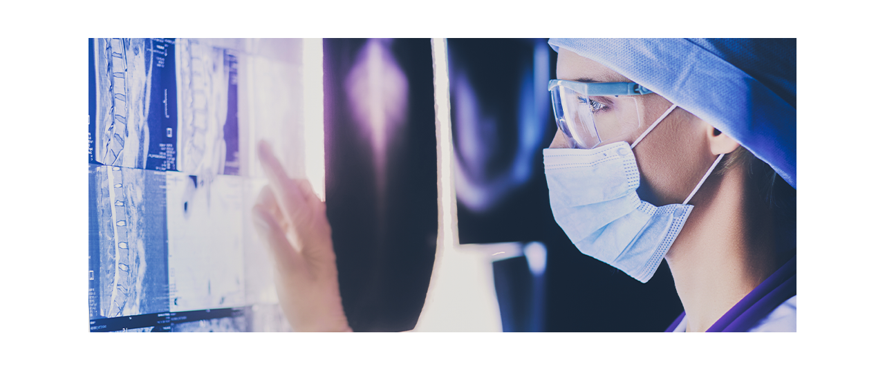Clinician reviewing x-rays