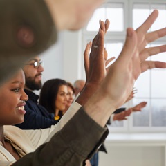 Volunteers Raising Hands