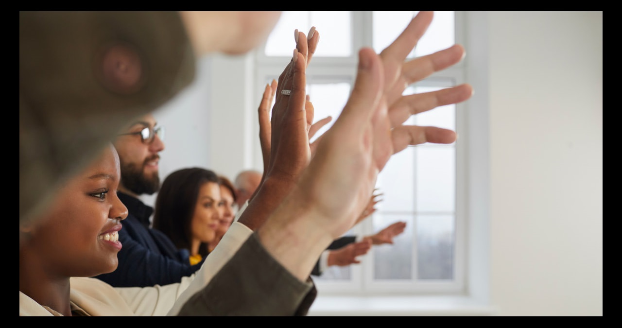 Volunteers Raising Hands